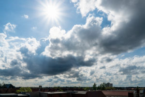 Berlin, distant view to the west, sun with rays and dramatic clouds, cumulus Berlin, distant view to the west, sun with rays and dramatic clouds, cumulus